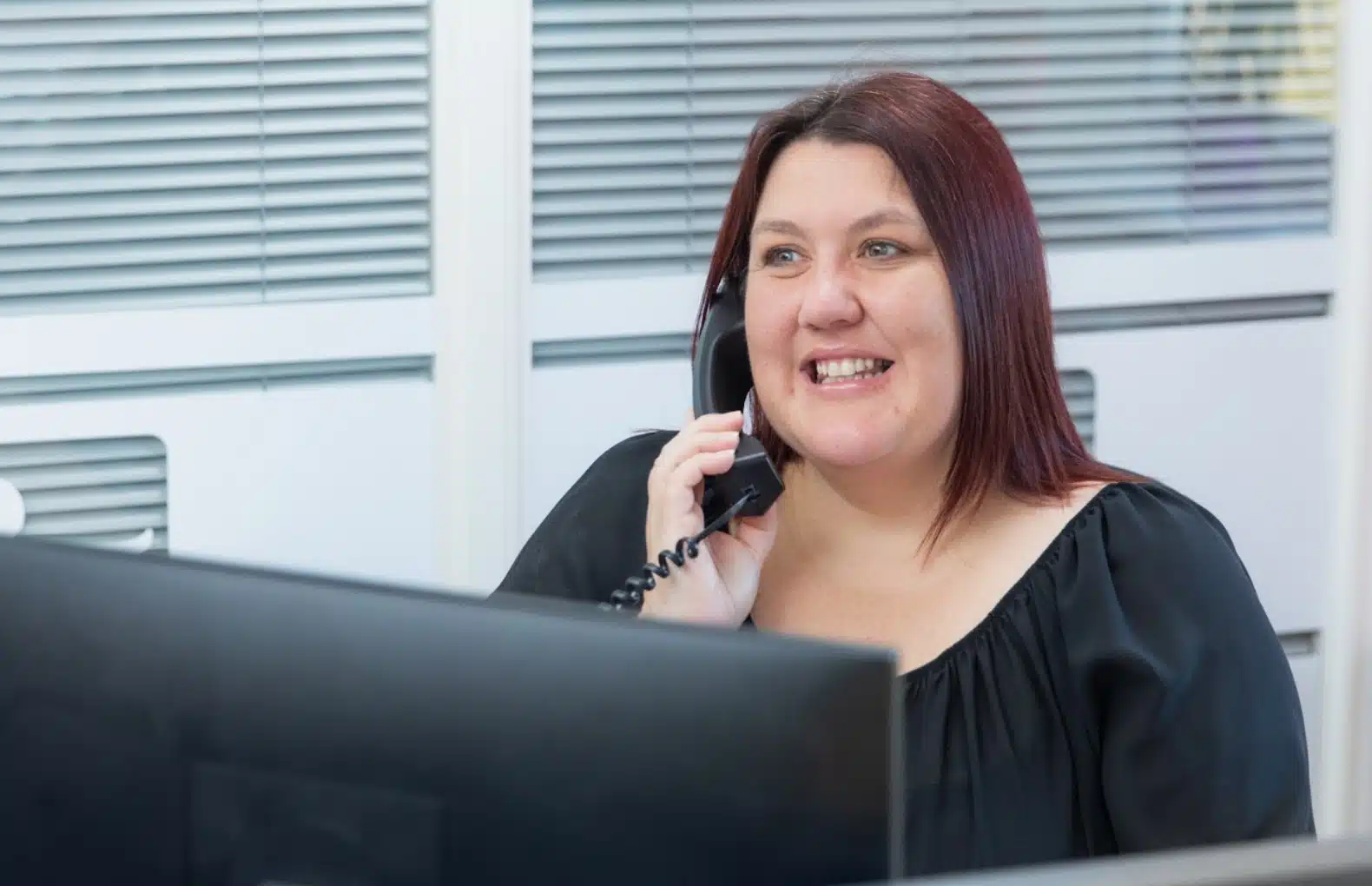 Kerry worker at Back Office Support smiling